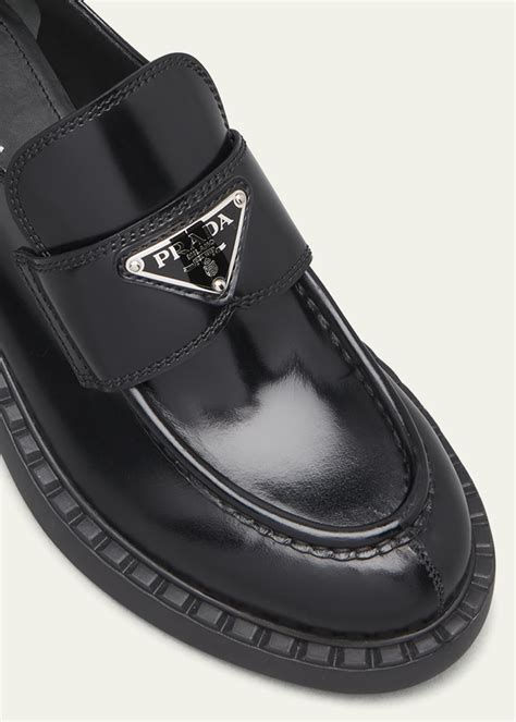 prada leather triangle logo loafers